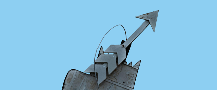 A metallic arrow pointing upwards