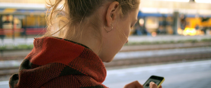 A young woman checking her smartphone